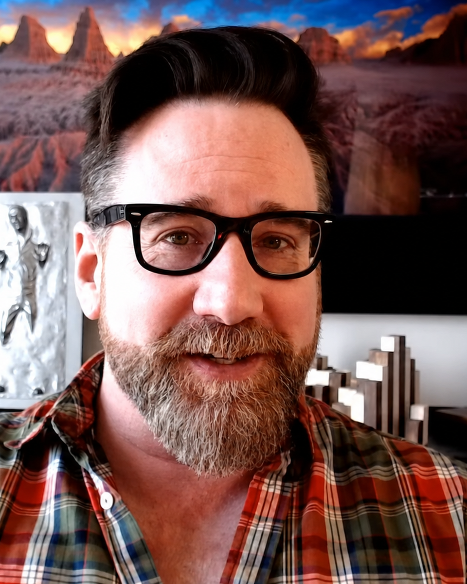 Josh Bachynski smiling in his studio
